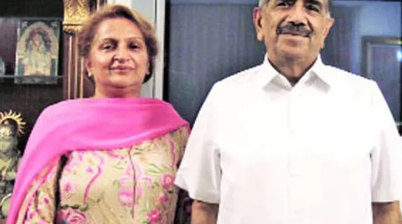 RK Dhawana and wife