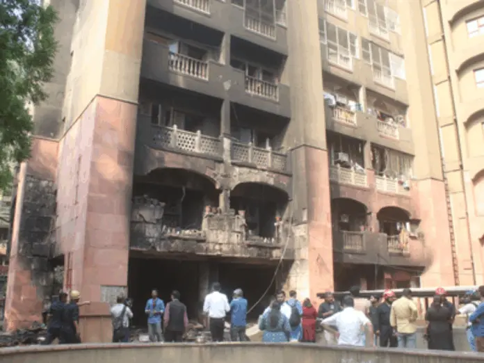 brahmaputra building fire sparks political firestorm in delhi, ब्रह्मपुत्र