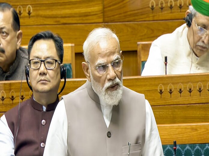 New Delhi: Prime Minister Narendra Modi speaks in the Lok Sabha during the second part of the Budget Session of Parliament in New Delhi on Monday, March 23, 2026. (Photo: IANS/Video Grab/Sansad TV)