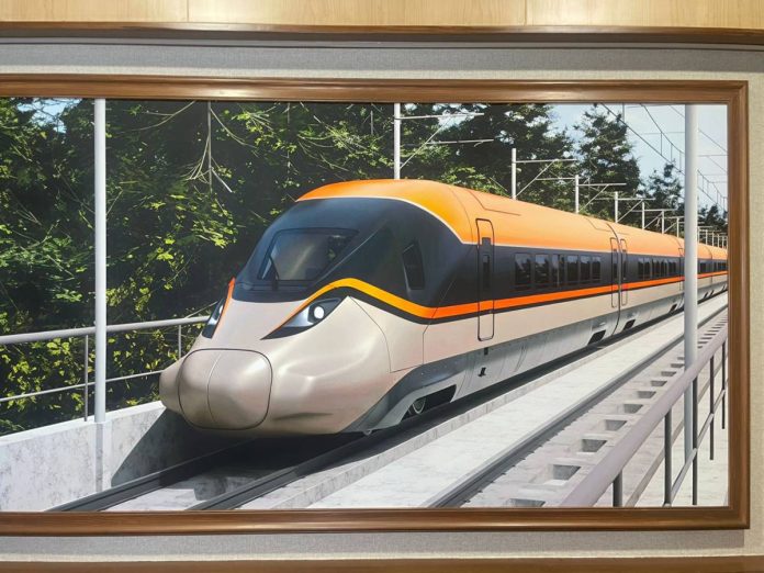 A picture of the country’s first proposed bullet train is installed at Gate Number 4 of Rail Bhavan in New Delhi on Monday, May 18, 2026. (Photo: IANS)