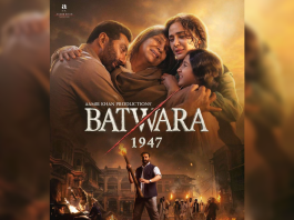 Poster for Batwara 1947 featuring a family embracing in the foreground with a fiery, crowded street scene in the background.